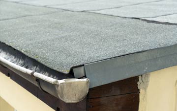 repair or replace Parchey flat roofing?